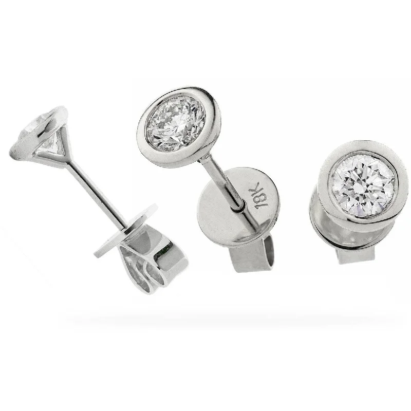 Cute Stud Earrings for Girls-ROUND BRILLIANT SOLITAIRE EARRINGS IN RUB OVER SETTING 18K WHITE GOLD