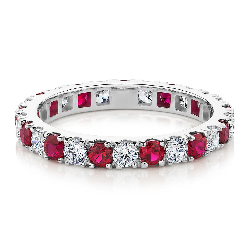 Birthstone Diamond Rings-All-rounder eternity band with ruby simulants and 0.78 carats* of diamond simulants in 14 carat white gold