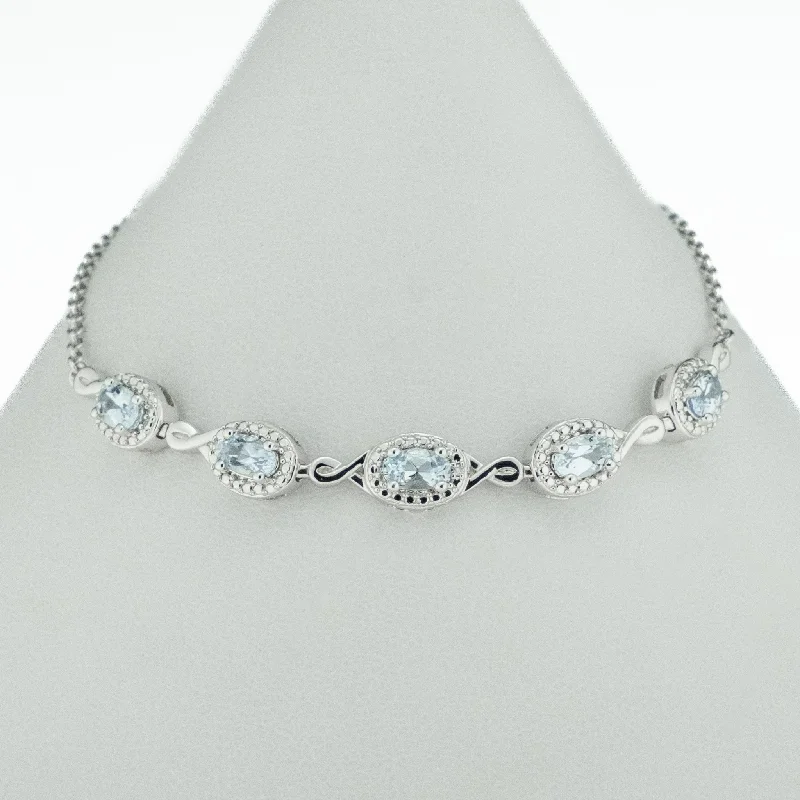 Colorful Gemstone Bracelets-0.97ctw Oval Aquamarine Accented 8" Bracelet in 10K White Gold