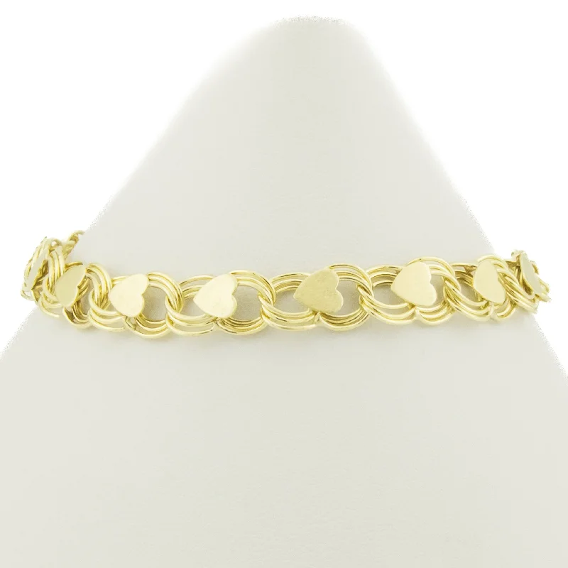 Classic Gold Charm Bracelets-7mm Wide Gold Hearts Fancy 7.25" Bracelet in 14K Yellow Gold - 8.7 grams