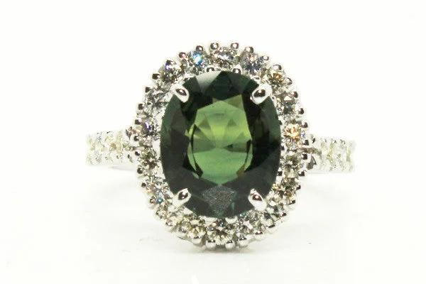 Customizable Wedding Bands-Green Sapphire And Diamond Halo Ring In 14k White Gold