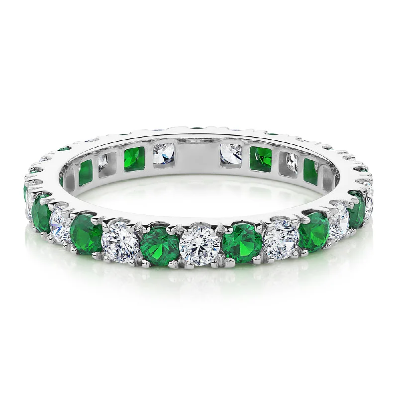 Matching Promise Rings-All-rounder eternity band with emerald simulants and 0.78 carats* of diamond simulants in 14 carat white gold