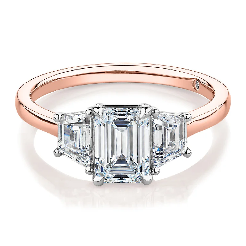 Stylish Gemstone Rings-Signature Simulant Diamond 1.87 carat* TW emerald cut three stone ring in 14 carat rose and white gold